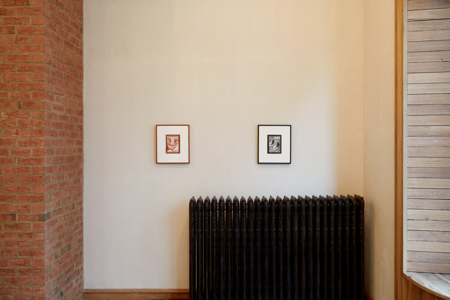 Installation view of paintings and drawings by Austin Eddy