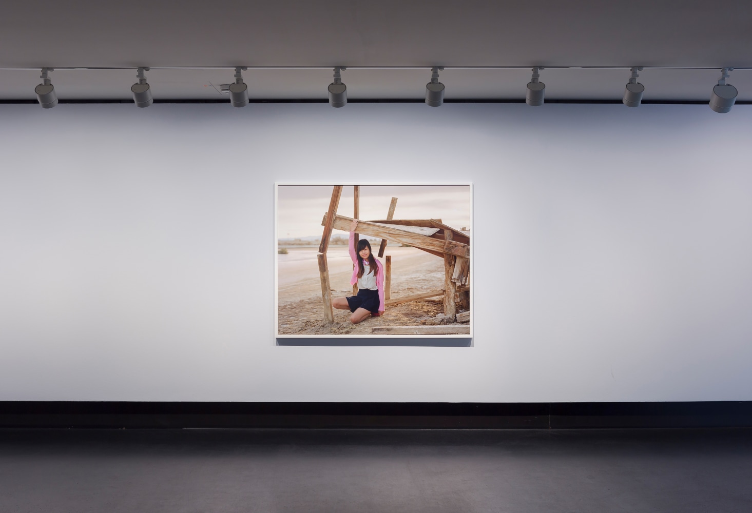 Installation view of photographs by Torbjørn Rødland