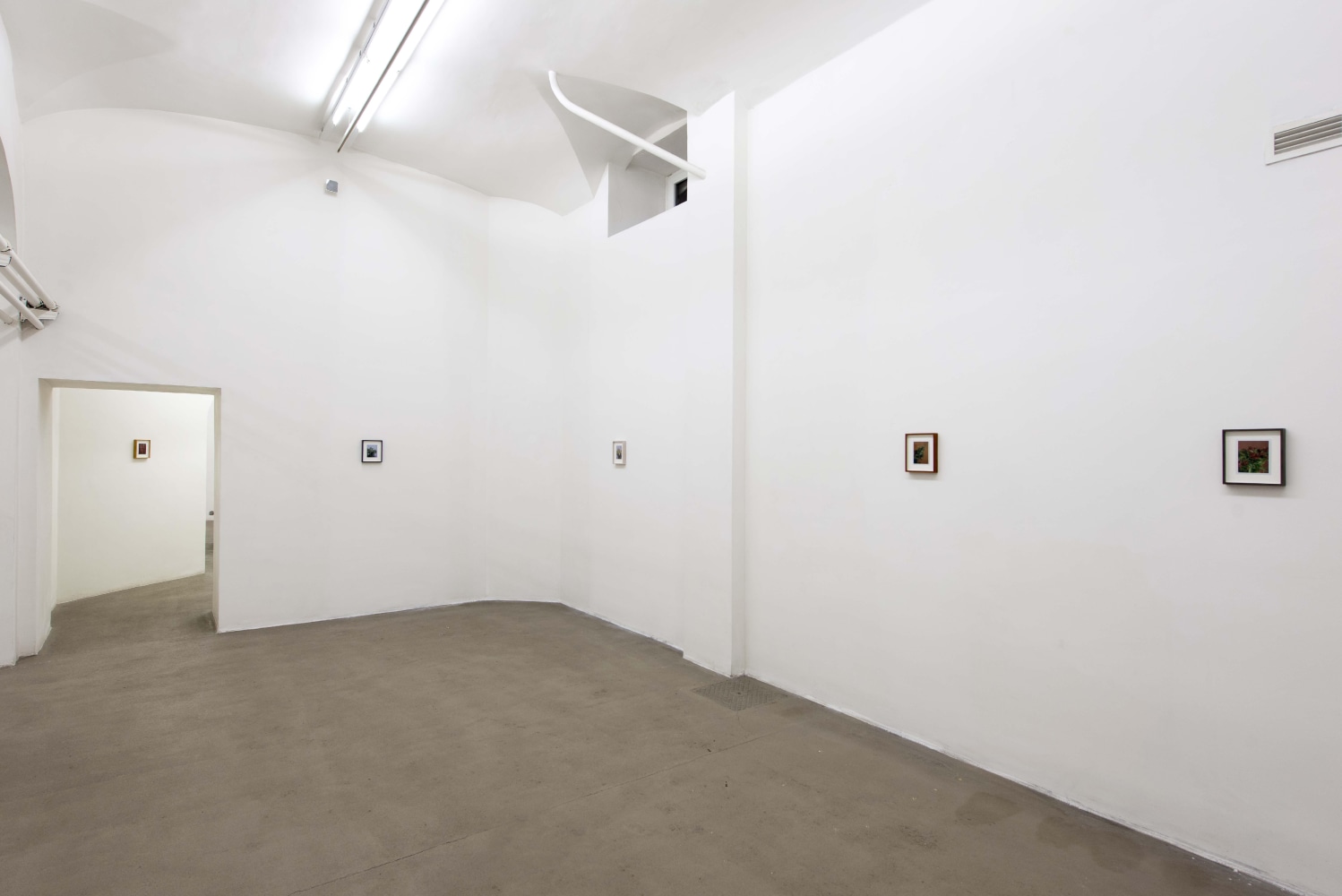 Installation view of sculptures and paintings by Sam Falls