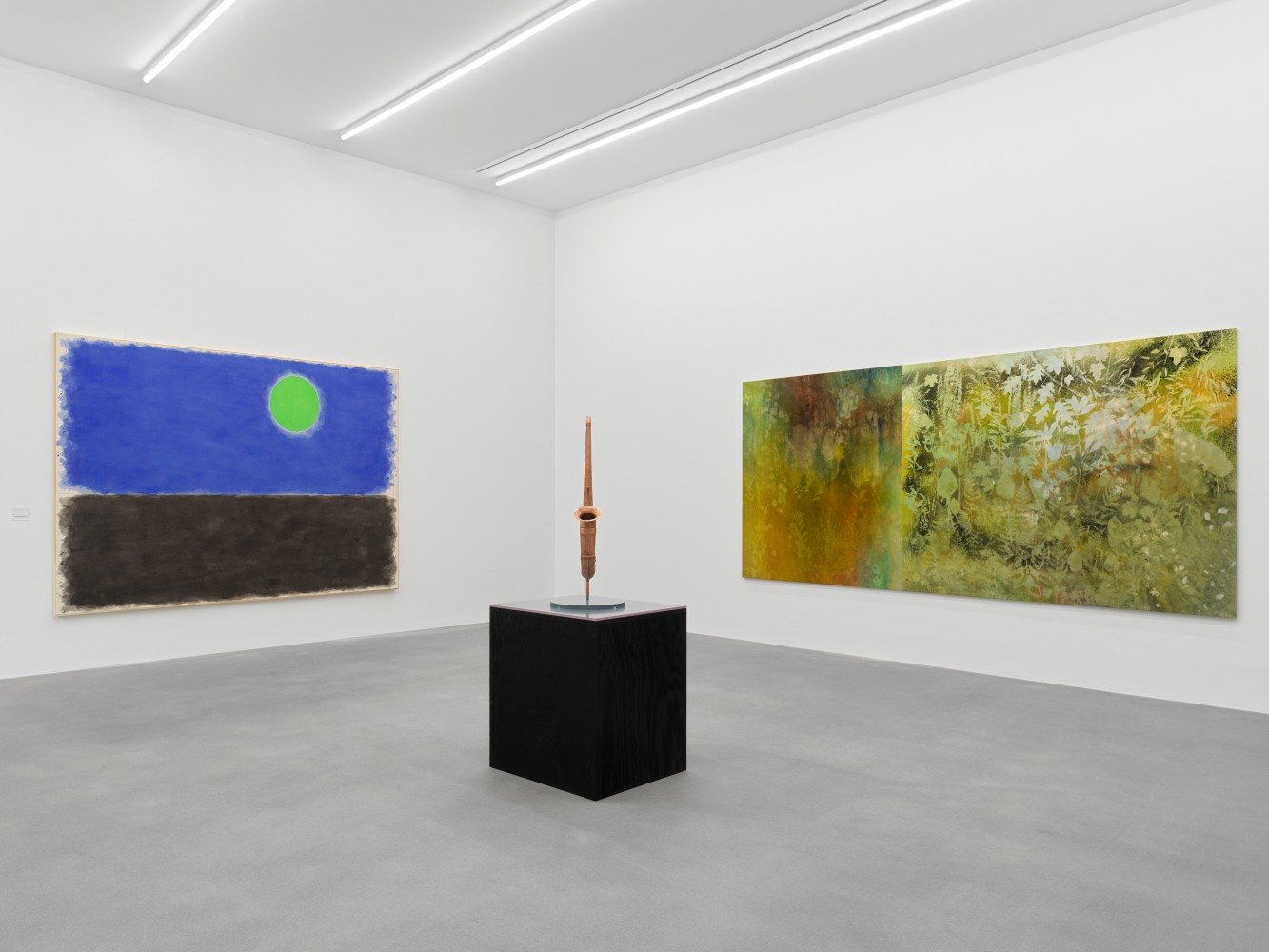 Installation view of group painting, print, and sculpture exhibition