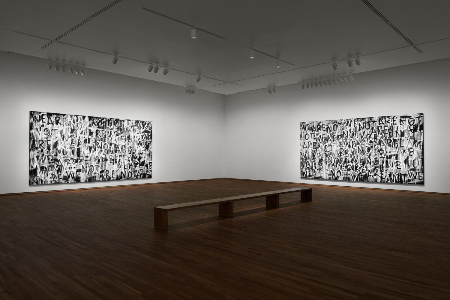 Installation view of black and white paintings by Adam Pendleton