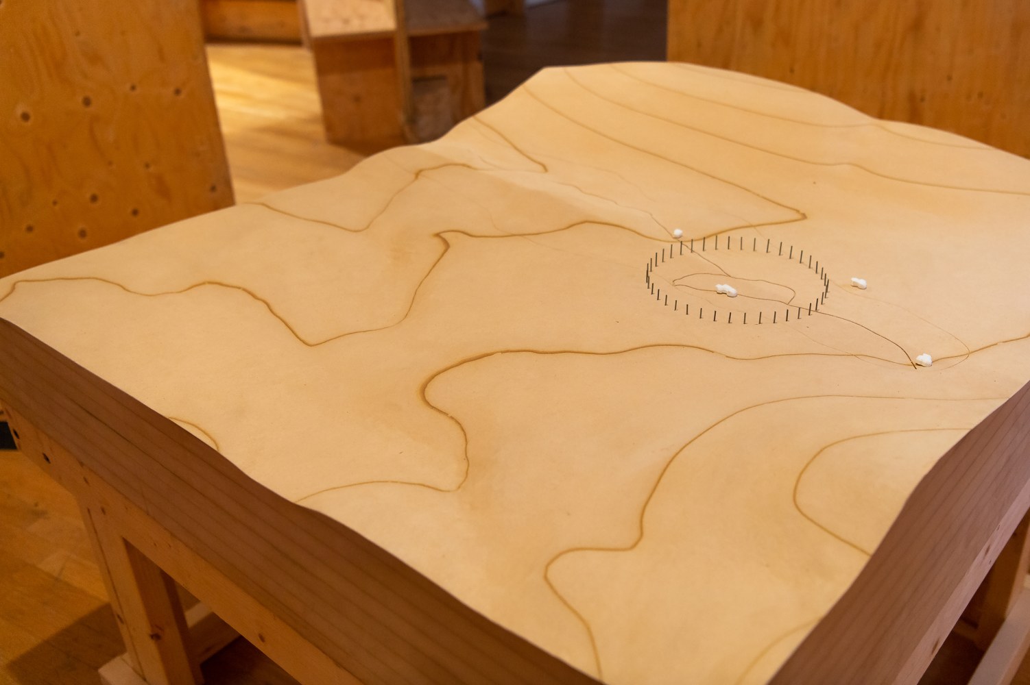 Installation view of living art installation by Oscar Tuazon