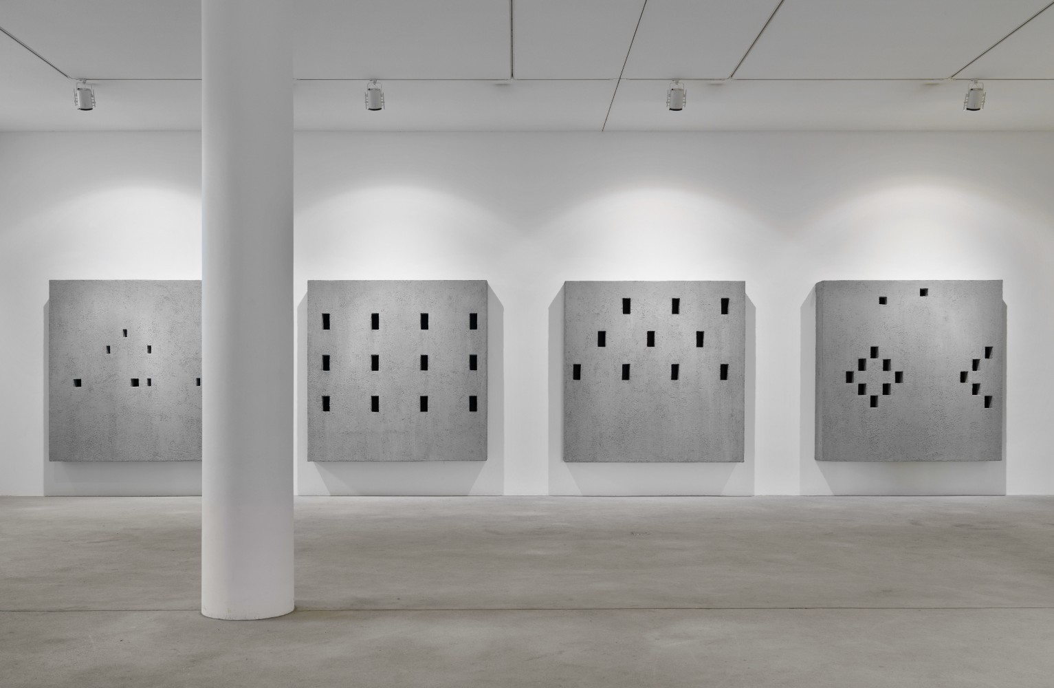 Installation view of wall works by Valentin Carron