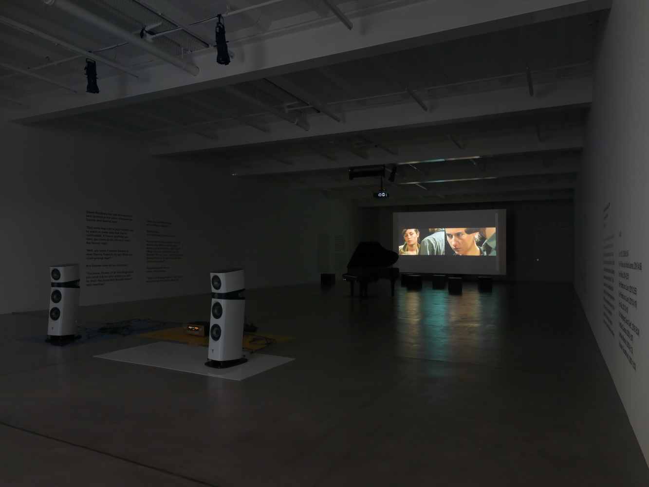 Installation view of Liam Gillick audio and film installation exhibition