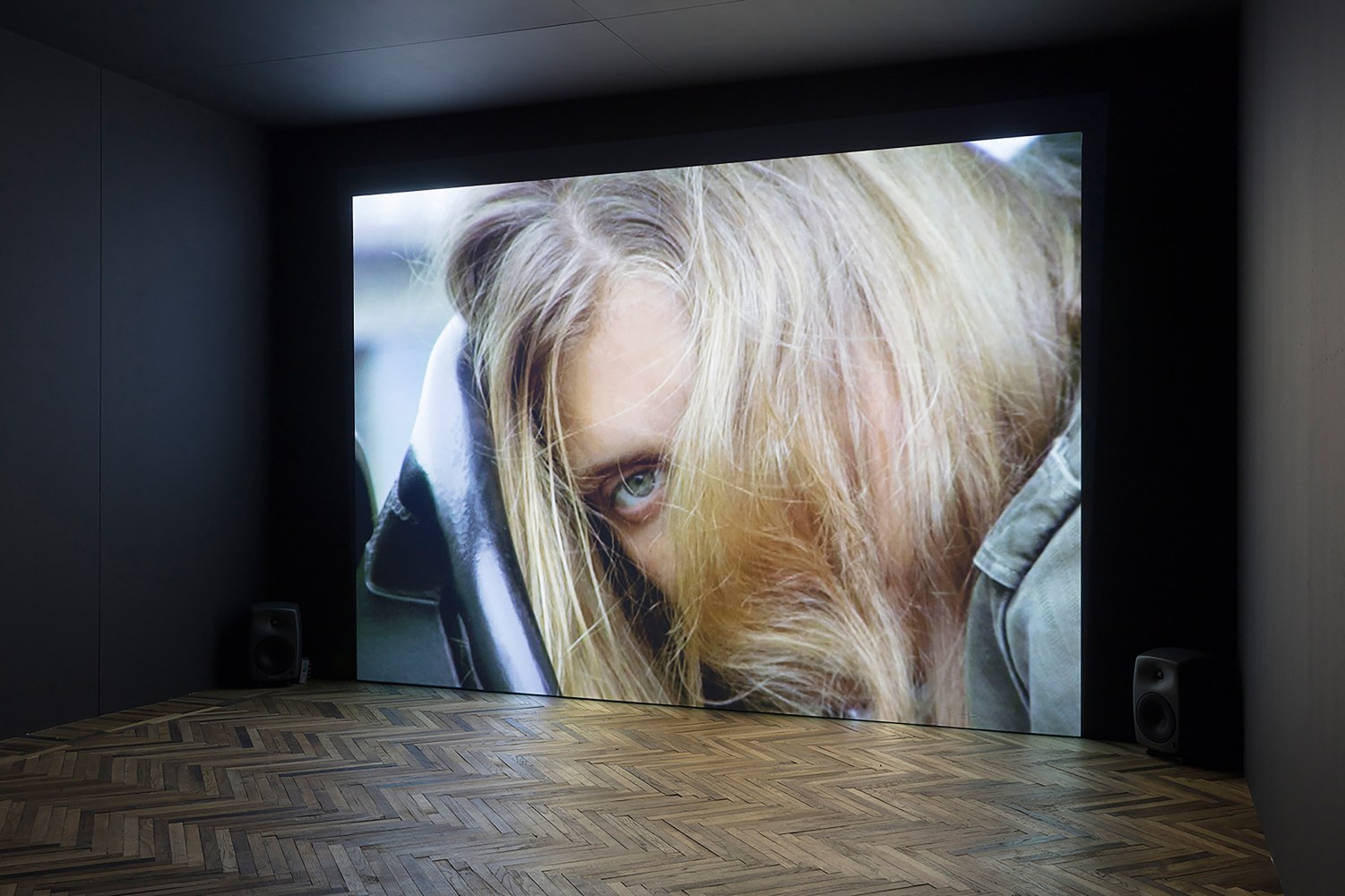 Installation view of video installation by Torbjørn Rødland