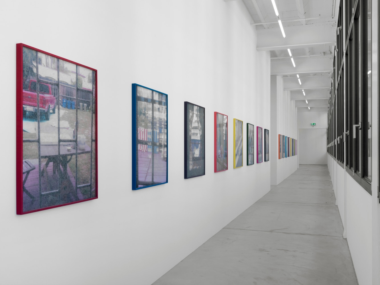 Installation view of Sam Falls paintings and sculptures exhibition