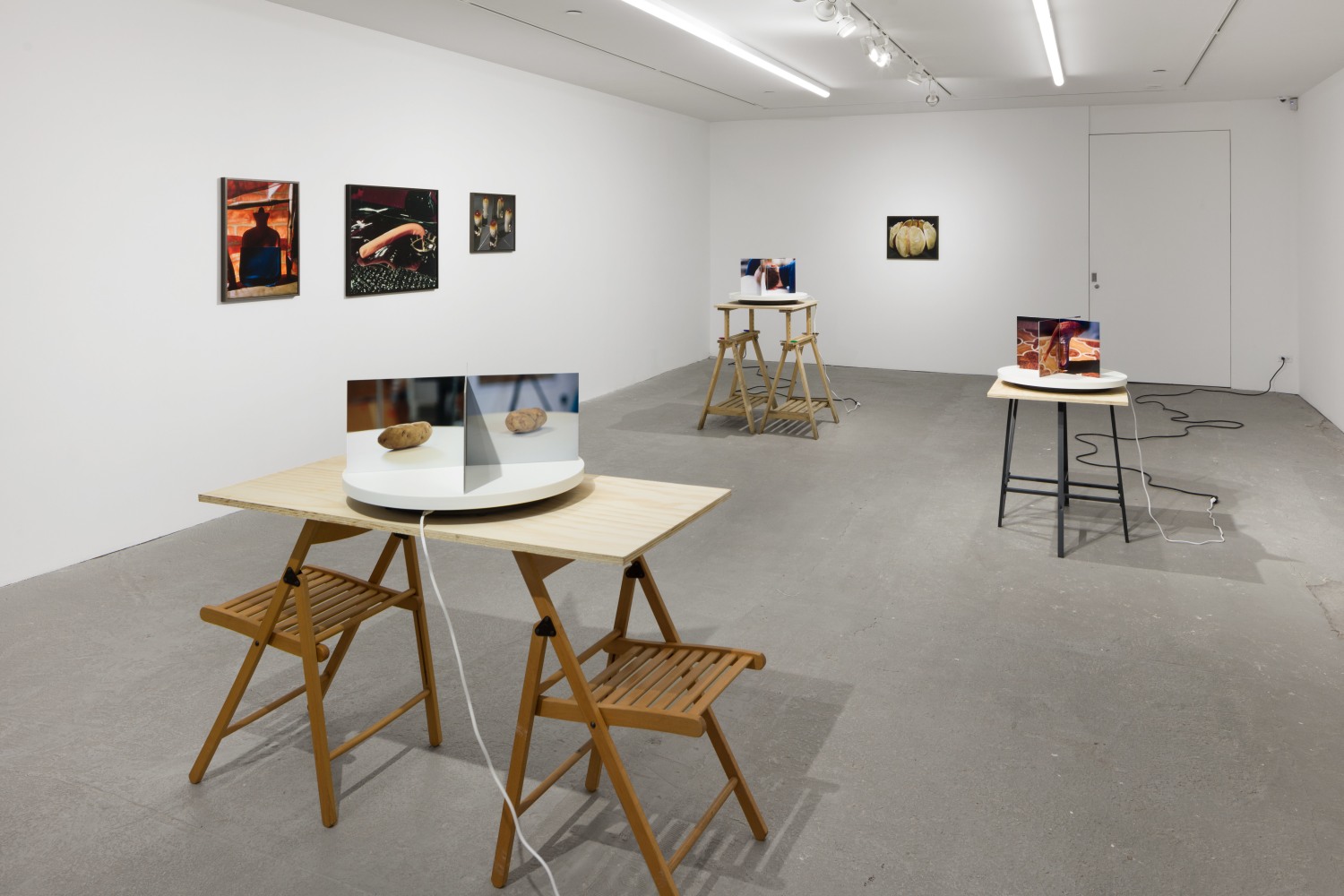 Installation view of Lucas Blalock photography and sculpture exhibition