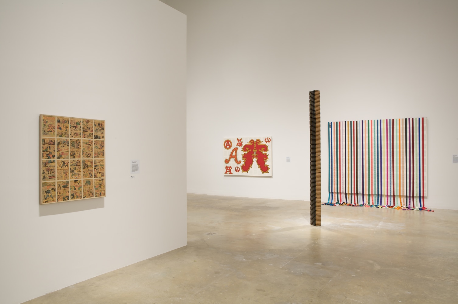 Installation view of paintings by Tim Rollins and K.O.S.