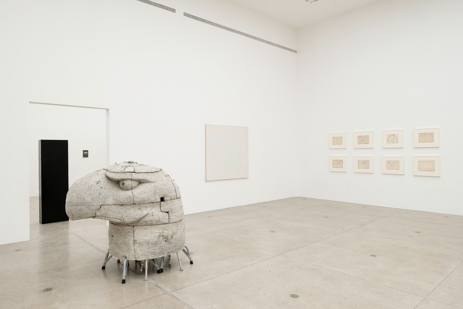 Installation view of sculptures by Justin Matherly and various works by other artists