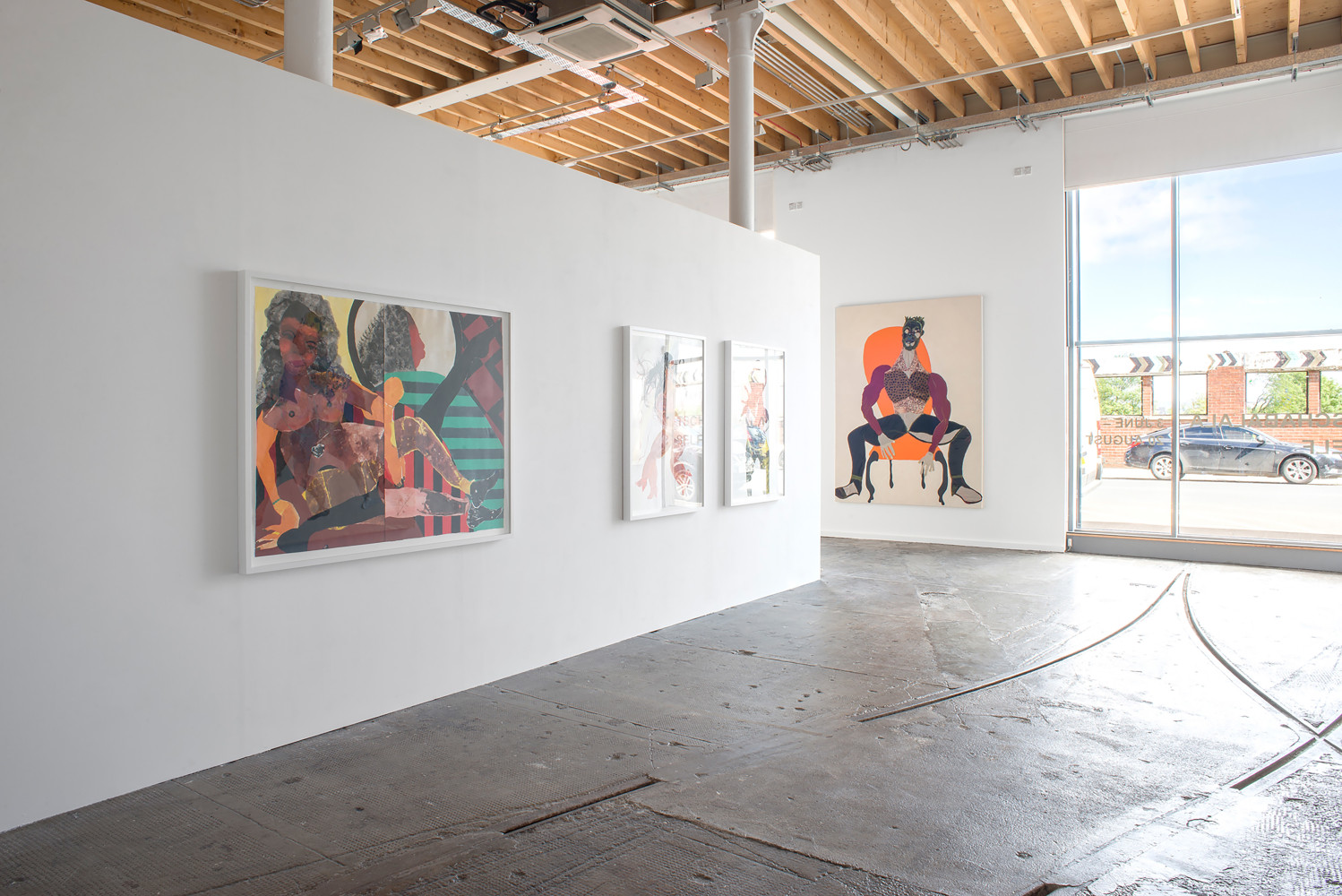 Installation view of paintings by Tschabalala Self