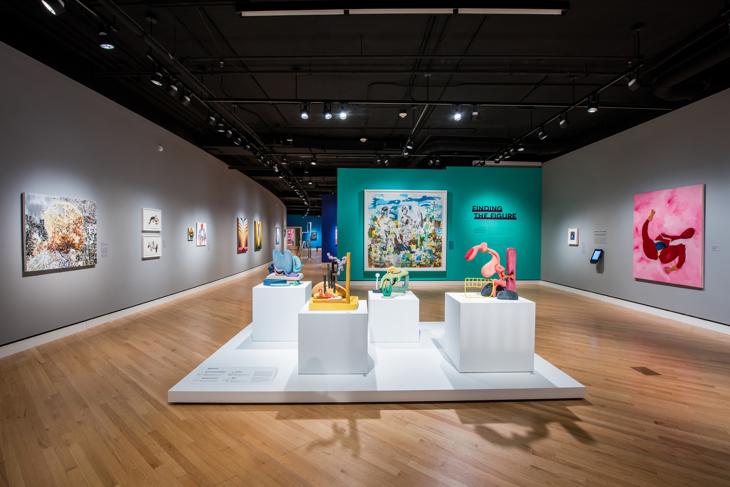 Installation view of paintings by Tschabalala Self