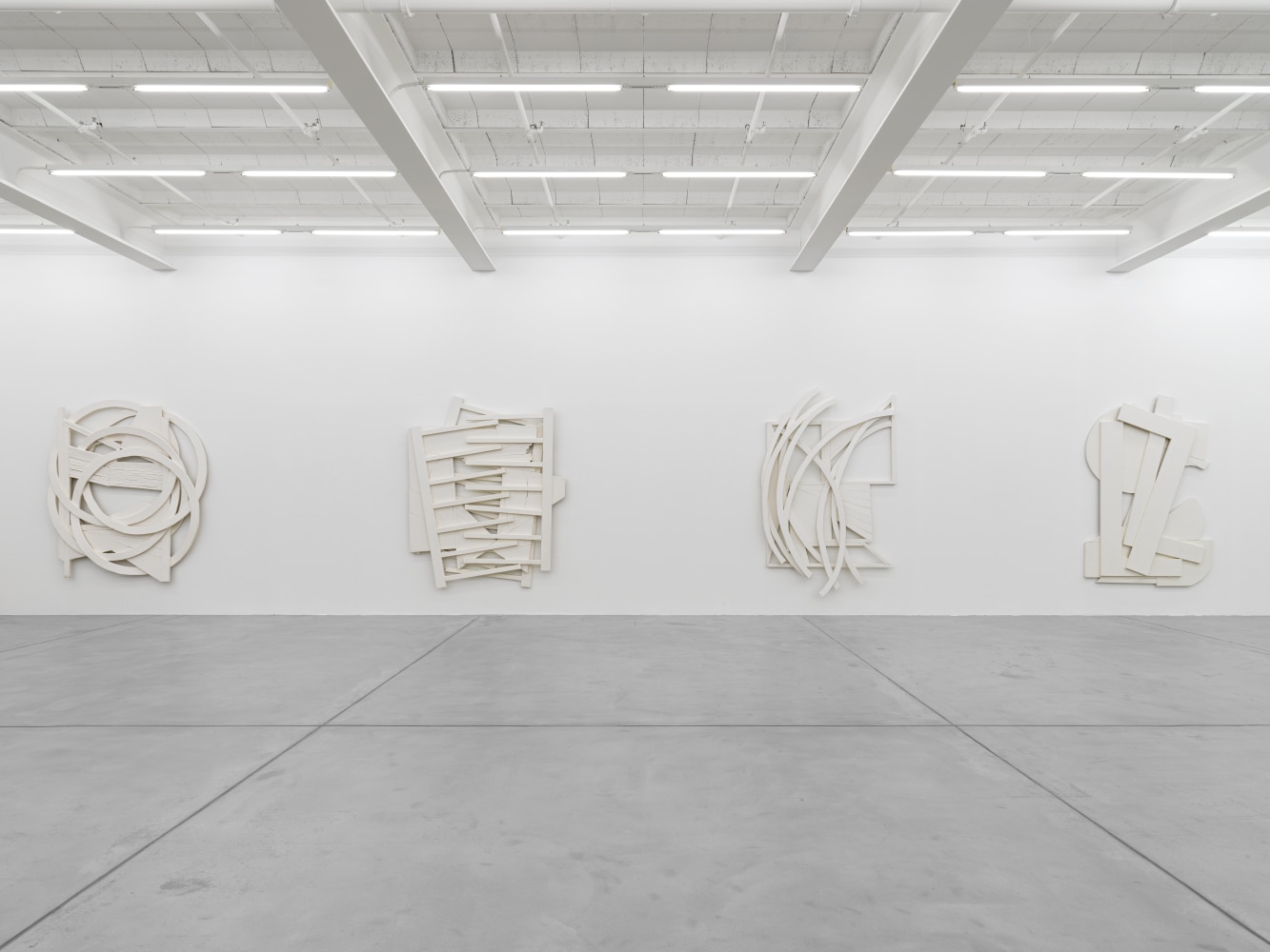 Installation view of Wyatt Kahn wall reliefs