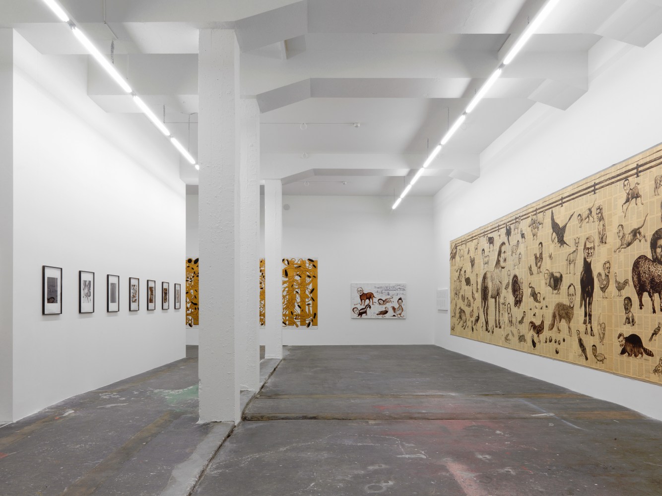 Installation view of Tim Rollins and K.O.S. paintings and text works exhibition