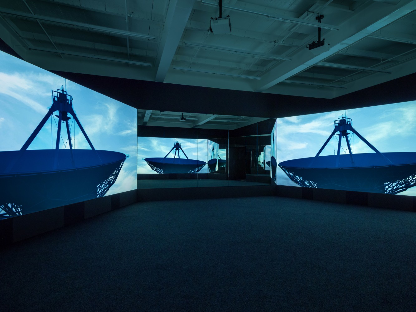 Installation view of Doug Aitken video and sculpture exhibition