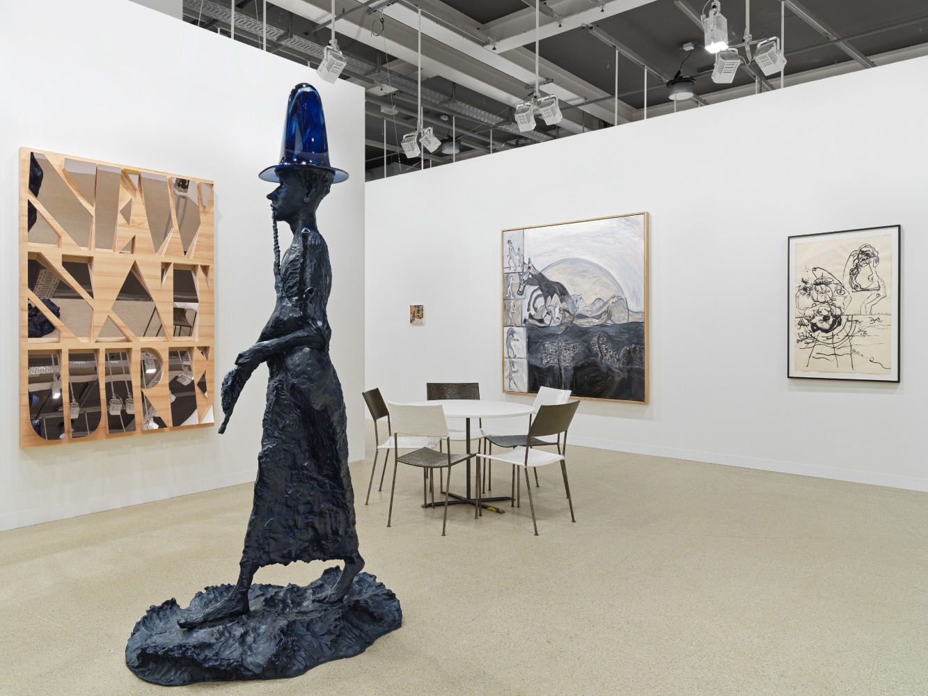 installation view of works by various artists at the Art Basel booth