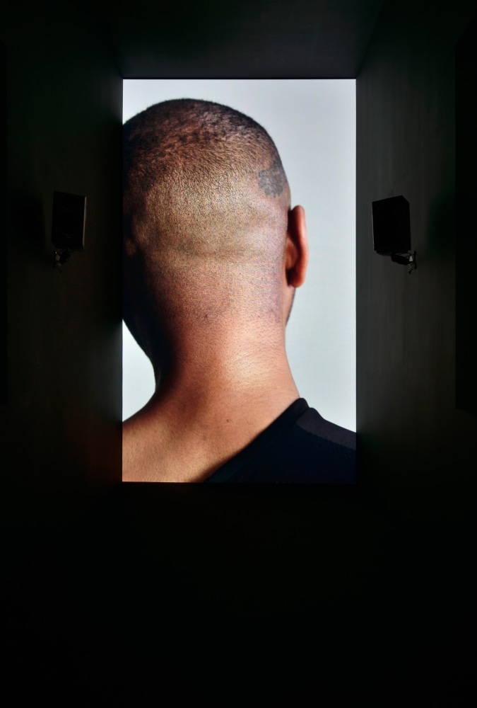 Installation view of video work by Adam Pendleton