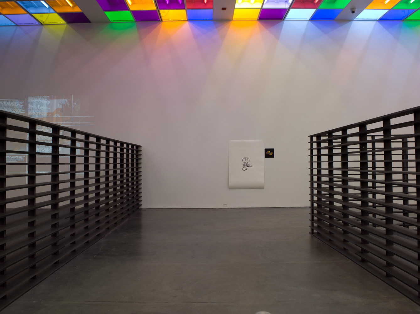 Installation view of sculptures and light installations by Liam Gillick