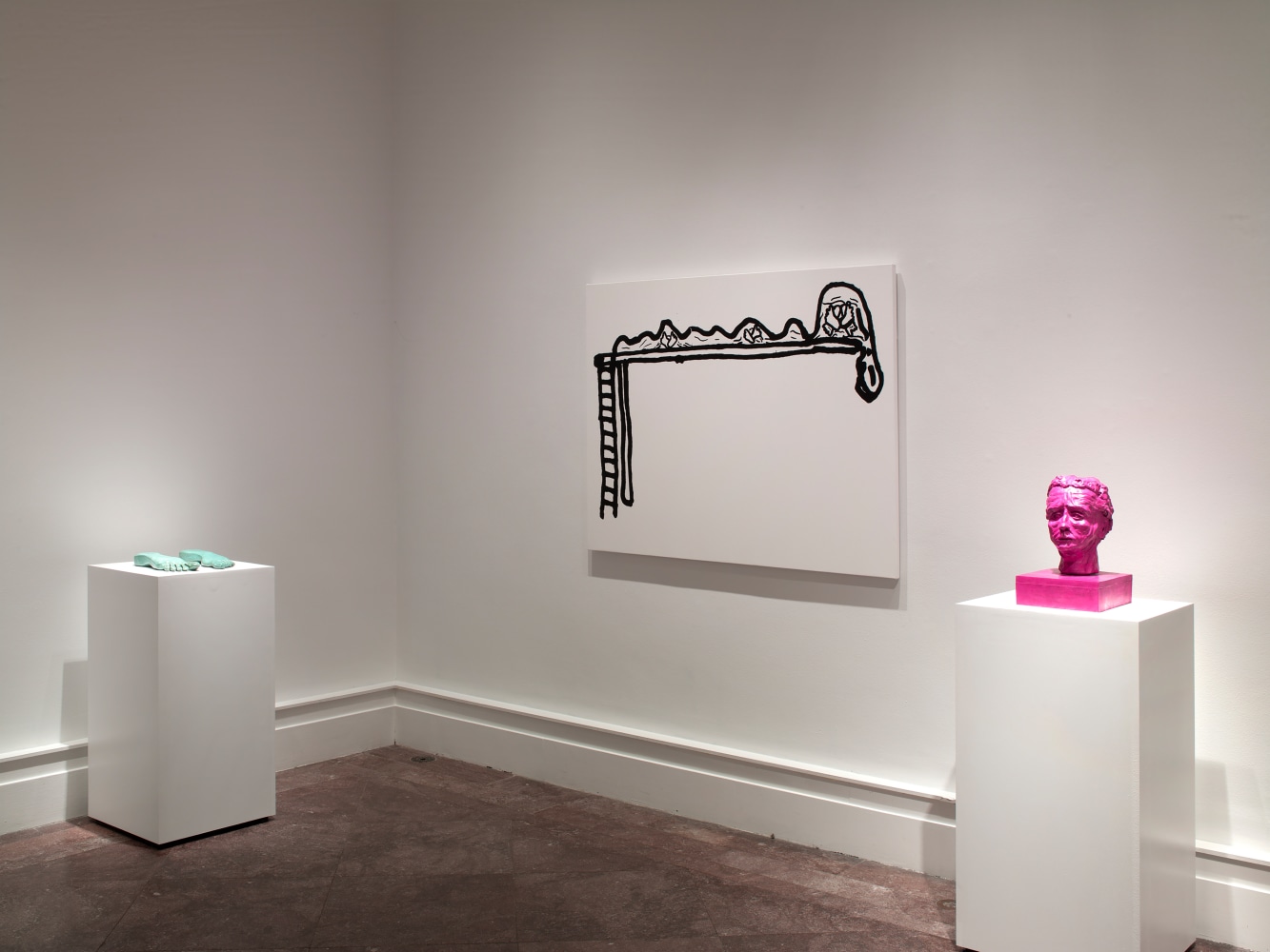 Installation view of paintings and sculptures by Joe Bradley