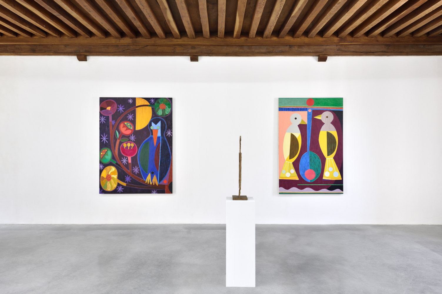 Installation view of paintings and sculptures by Austin Eddy