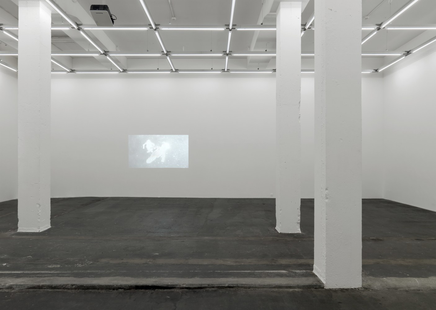 Installation view of Peter Fischli David Weiss film and sculpture exhibition
