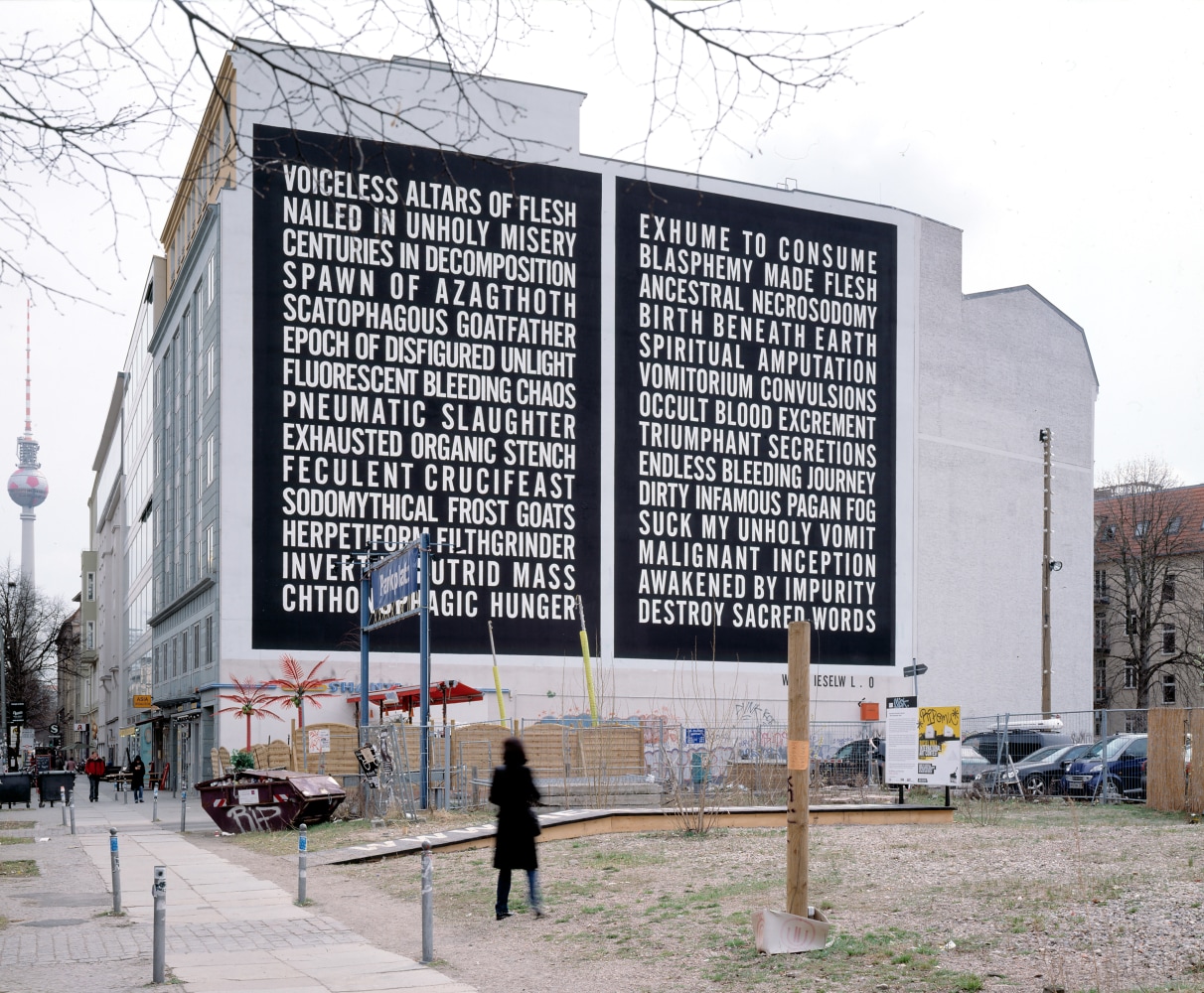 Installation view of outside wall work by Steven Shearer