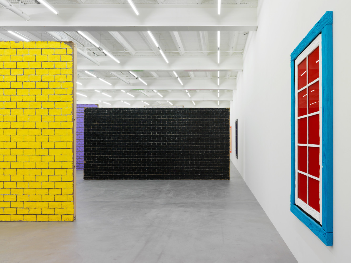 Installation view of Ugo Rondinone brick wall paintings exhibition