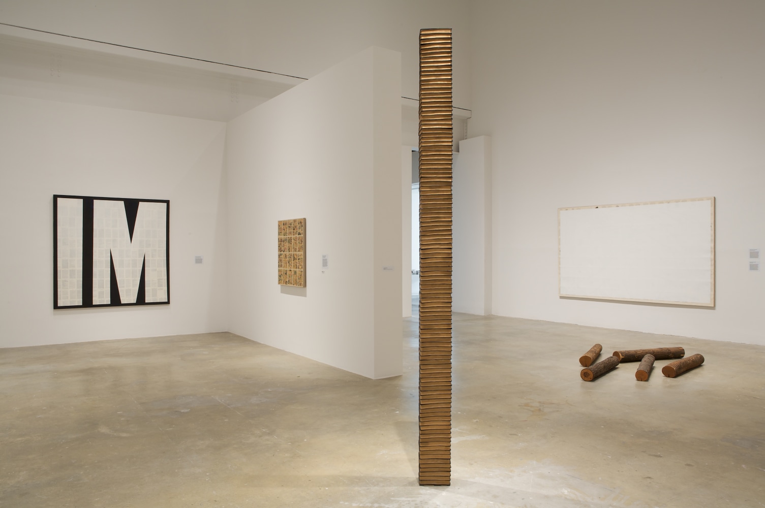 Installation view of paintings by Tim Rollins and K.O.S.