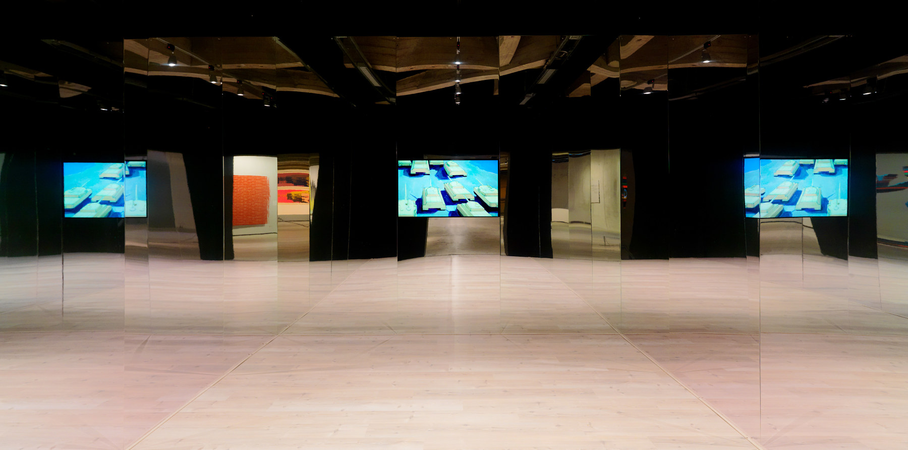 Installation by Liam Gillick, Hamilton 2014 HD video, screen, mirrored room 27:43 min Dimensions variable