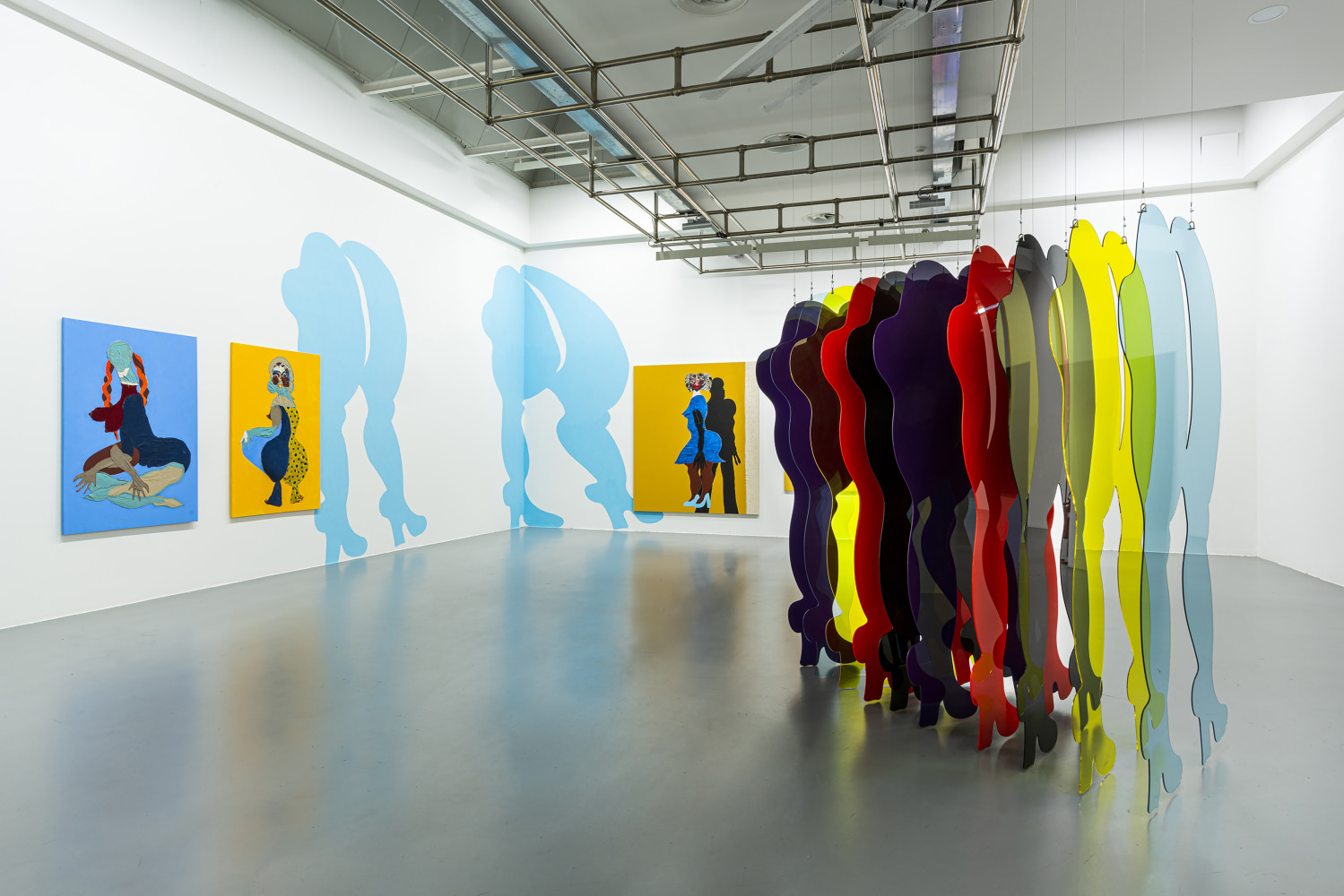 Installation view of paintings and sculptures by Tschabalala Self