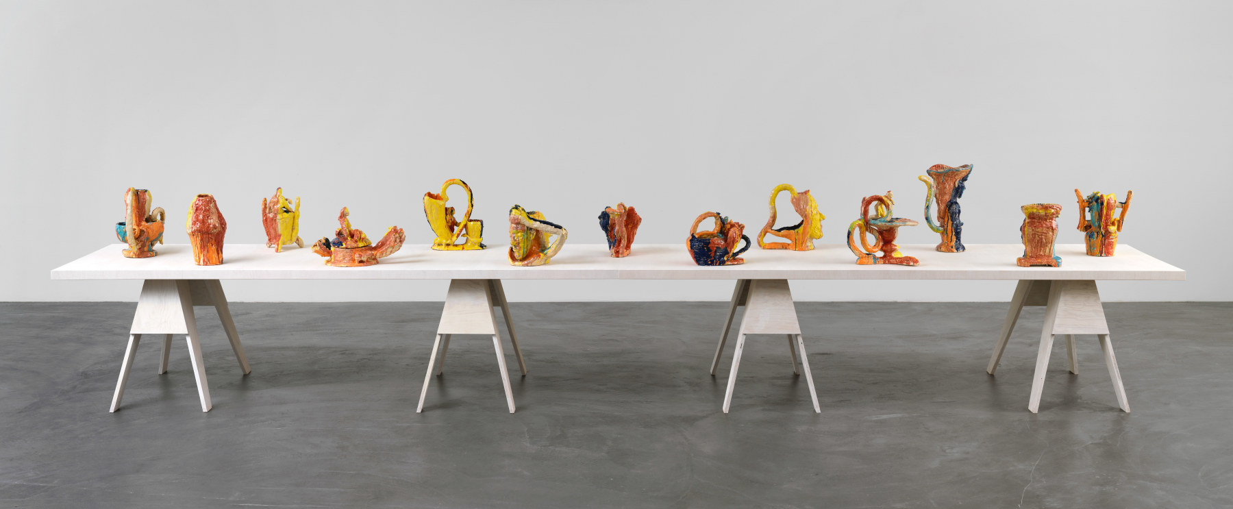 Group of sculptures by Andrew Lord on table