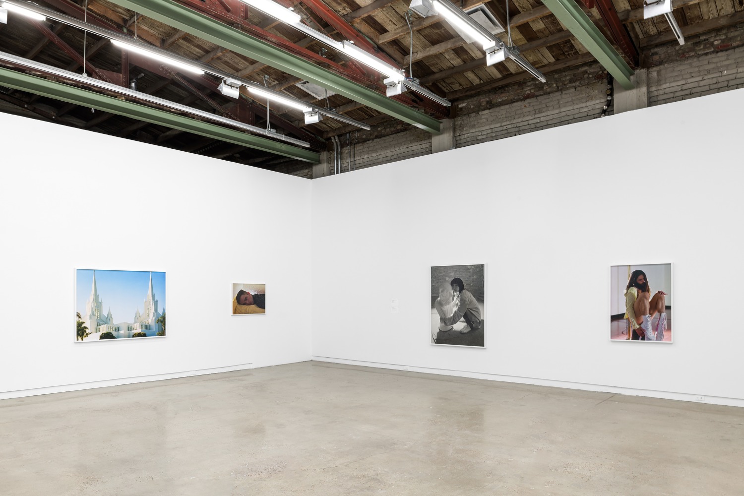 Installation view of photographies by Torbjørn Rødland