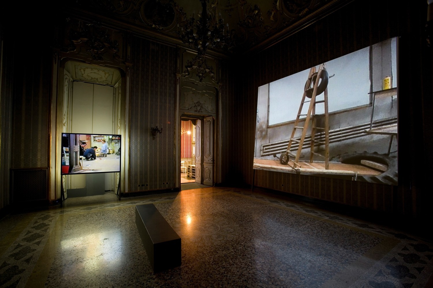 Installation view of video works by Peter Fischli and David Weiss