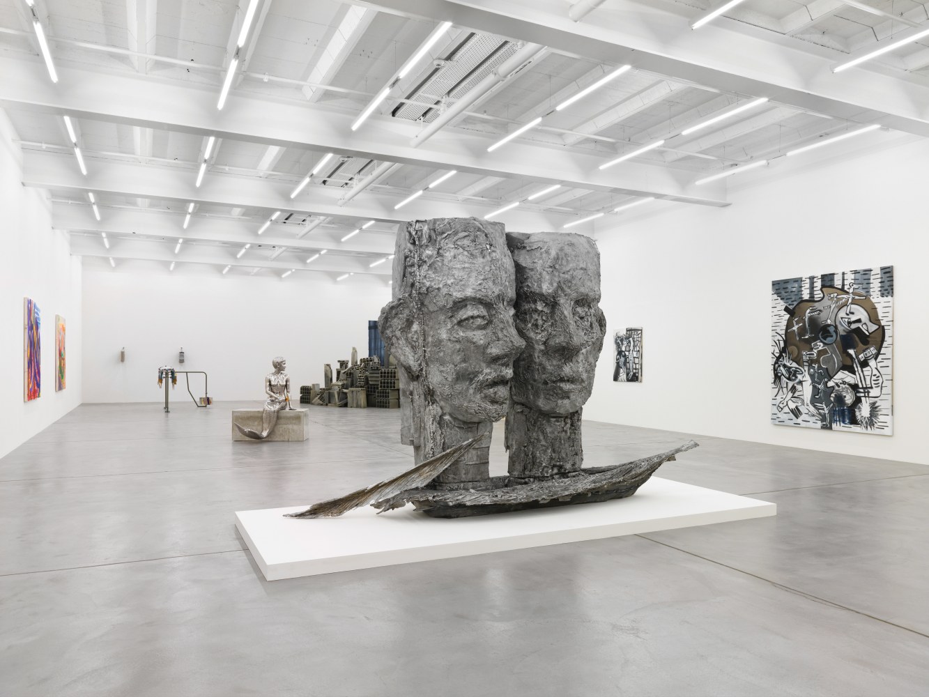 Installation view of group painting, sculpture, and film exhibition