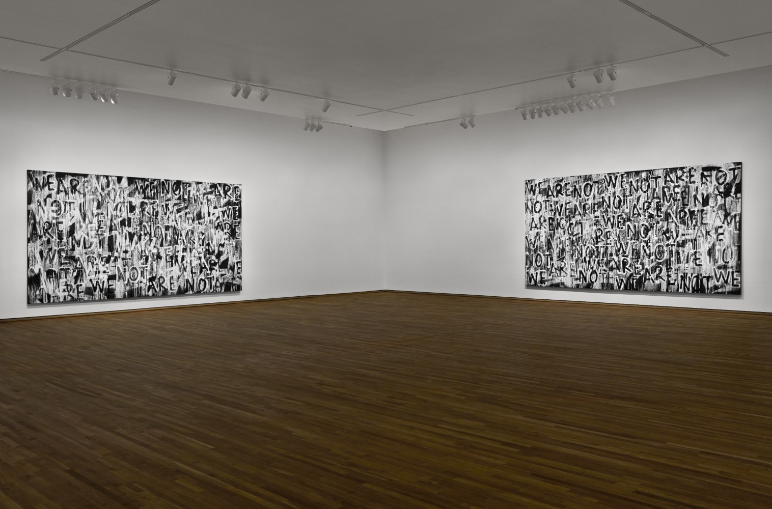 Installation view of black and white paintings by Adam Pendleton