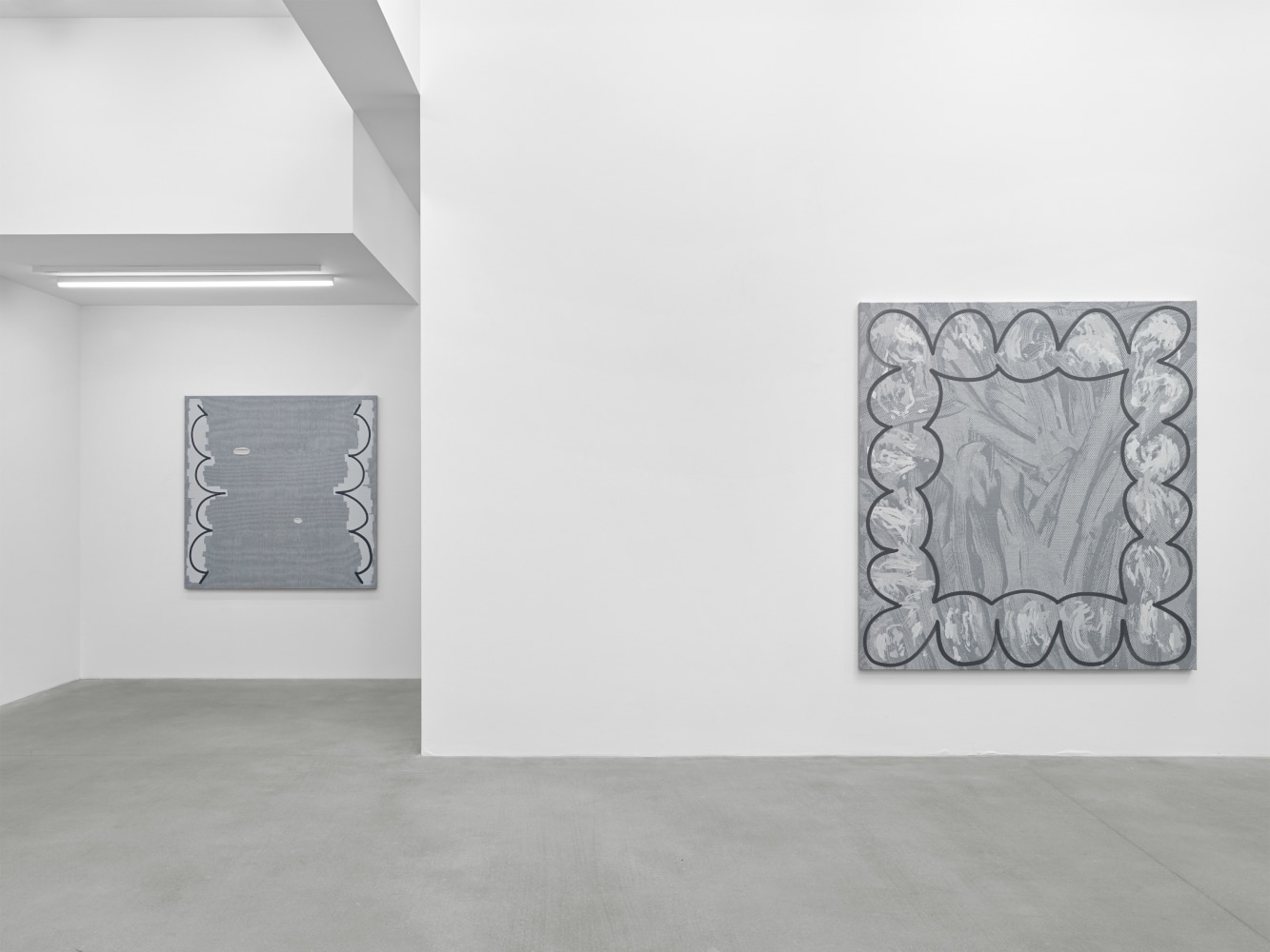 installation view of grayscale paintings by Amy Feldman