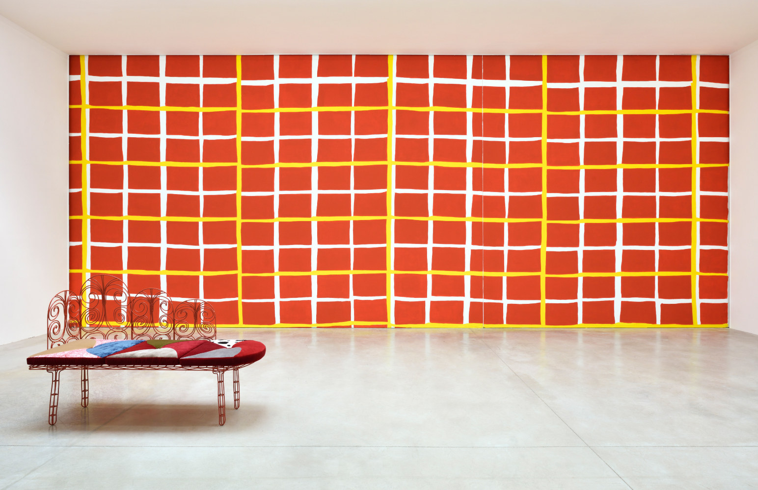 Installation view of paintings and furniture works by Tschabalala Self