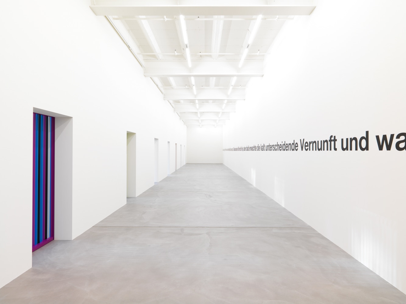 Installation view of Liam Gillick wall-based graphic works and wall hangings exhibition