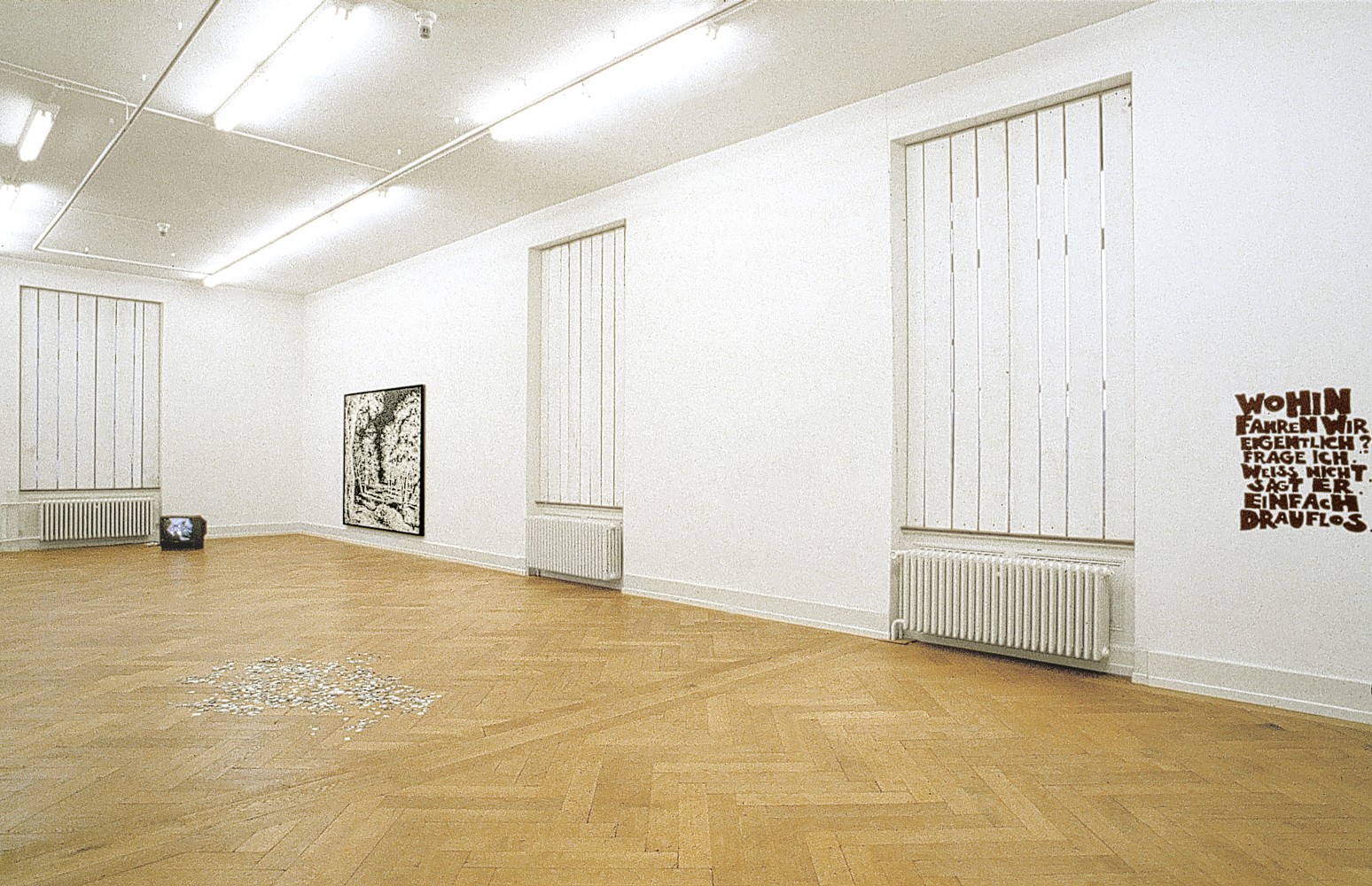 Installation view of paintings and wall works by Ugo Rondinone