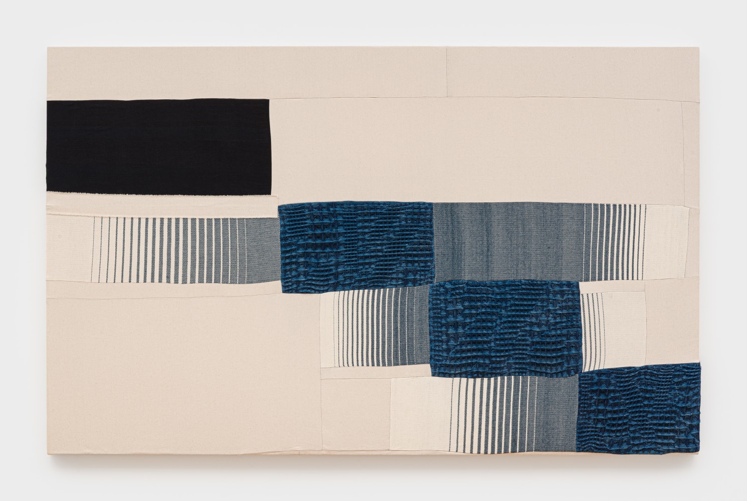 Jovencio de la Paz
Warped Grid 6.1, 2025
handwoven jacquard textiles, cotton, wool, linen, and indigo
60 x 96 x 2 ins.
152.4 x 243.8 cm