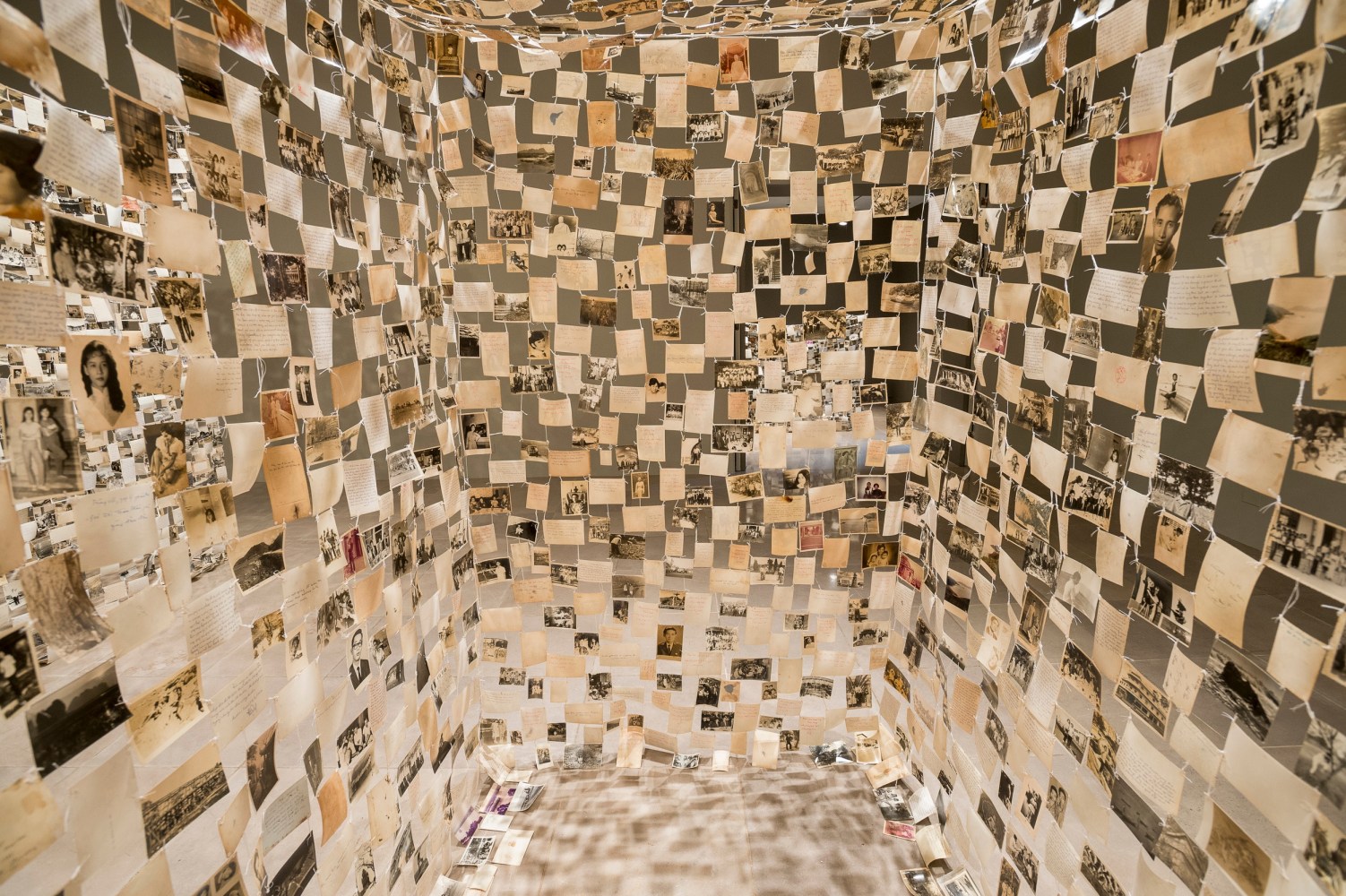 Dinh Q. L&amp;ecirc;
detail of Crossing the Farther Shore, 2014
found photographs, thread, and linen tape, seven parts
dimensions variable