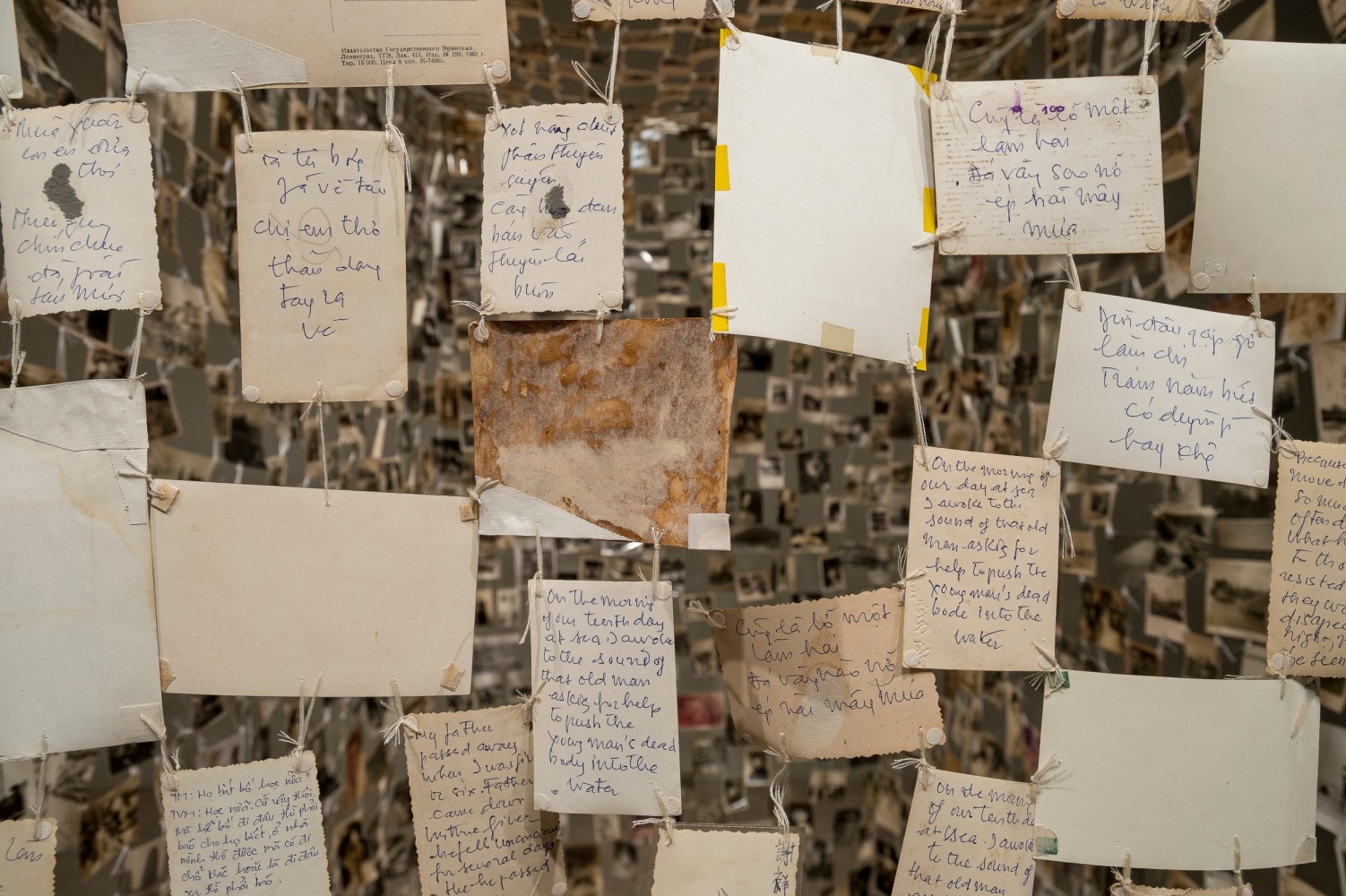 Dinh Q. L&amp;ecirc;
detail of Crossing the Farther Shore, 2014
found photographs, thread, and linen tape, seven parts
dimensions variable