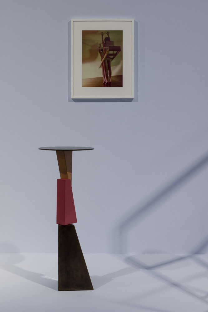 Paul P., Terminal Figure, 2019. Courtesy the artist; Maureen Paley, London; Greene Naftali, New York; Cooper Cole, Toronto; and Massimo Minini, Brescia &amp;copy; the artist (front) and Jimmy DeSana, Ladder, 1980. Courtesy Jimmy DeSana Trust; P&amp;middot;P&amp;middot;O&amp;middot;W, New York; Meyer Riegger, Berlin/Karlsruhe/Basel; and Amanda Wilkinson Gallery, London &amp;copy; Jimmy DeSana Trust (back). Installation view of the exhibition Jimmy DeSana &amp;amp; Paul P. &amp;ndash; Ruins of Rooms at KW Institute for Contemporary Art, Berlin 2024, Photo: Frank Sperling.