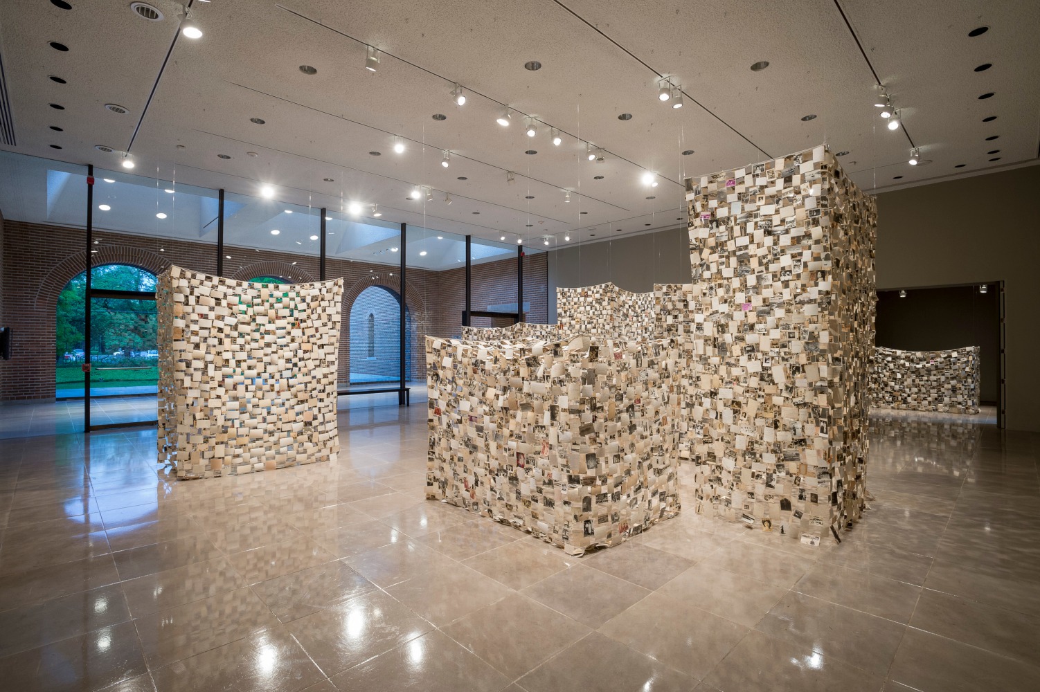 Dinh Q. L&amp;ecirc;
Crossing the Farther Shore, 2014
found photographs, thread, and linen tape, seven parts
dimensions variable