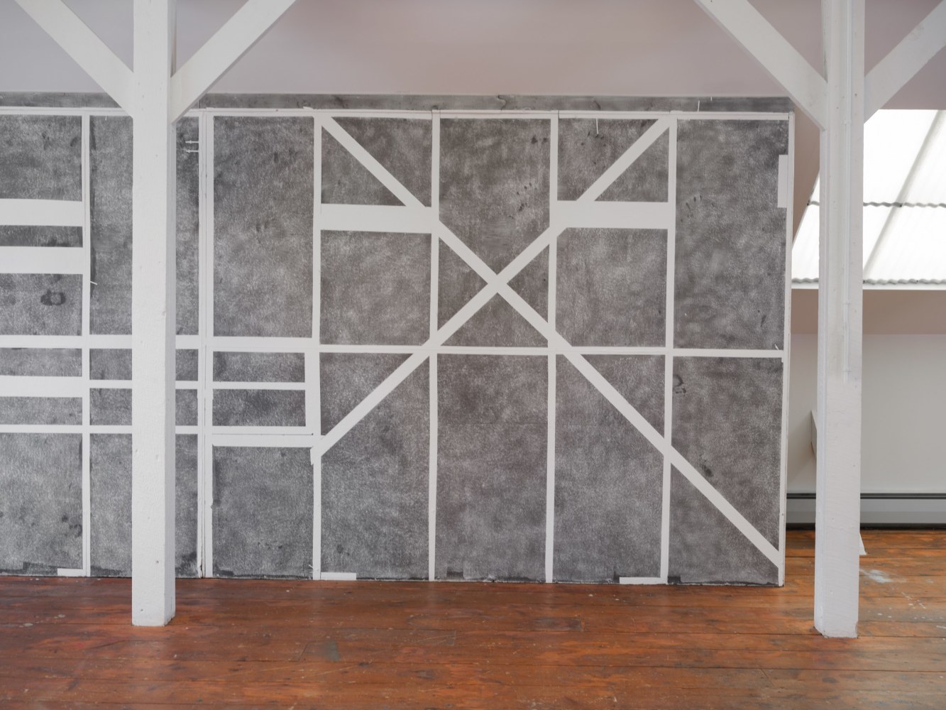 Color photograph of an abstract graphite wall drawing by Gabriela Salazar at the Al Held Foundation, 2021. Exhibition curated by Olga Dekalo and River Valley Arts Collective.