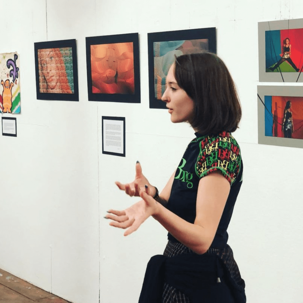 Onteora High School student discussing her artwork inspired by Al Held