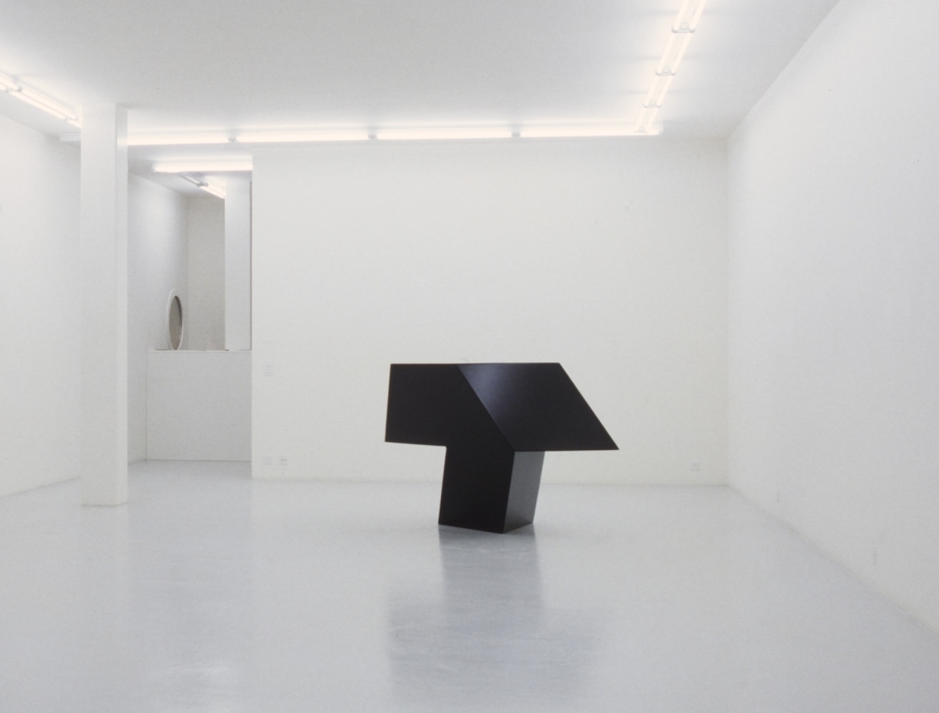 Aluminum, painted black
45 &amp;times; 70 &amp;times; 423&amp;frasl;4 in. (114.3 &amp;times; 177.8 &amp;times; 108.6 cm), edition 4/6
Tony Smith: Sculptures and Paintings. Art &amp;amp; Public, Geneva, Switzerland, 1995
Photo: Ilmari Kalkkinen