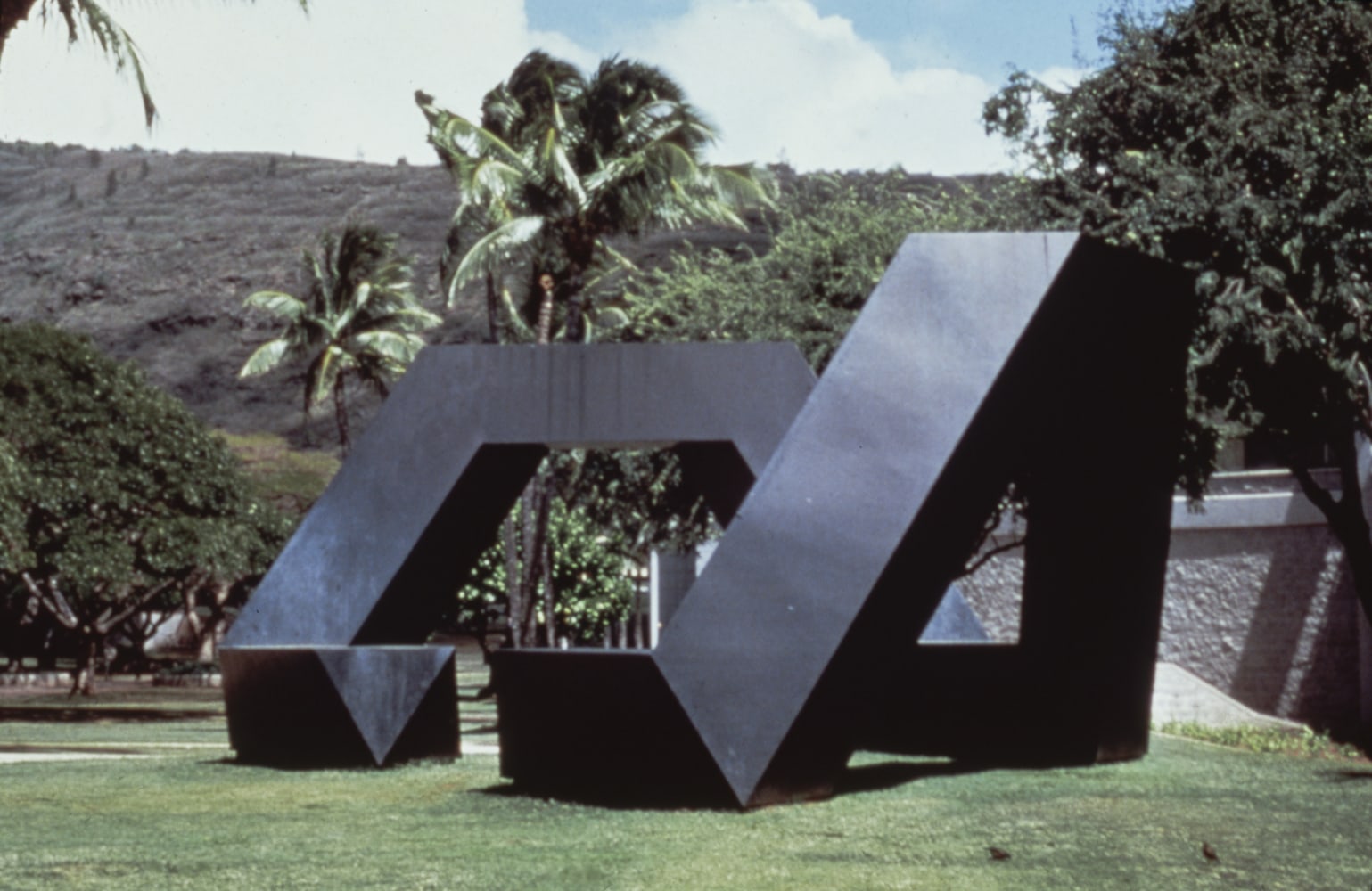 Steel, painted black
15 &amp;times; 37 &amp;times; 20 ft. (4.57 &amp;times; 11.28 &amp;times; 6.1 m), unique
Hawai&amp;#39;i State Foundation on Culture and the Arts, Honolulu
Photo: Joyce P Schwartz