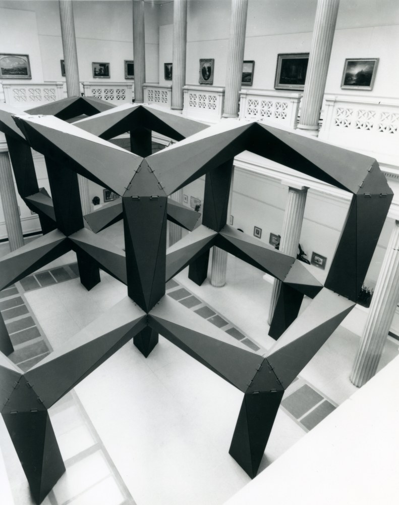 Plywood, painted black
24 &amp;times; 48 &amp;times; 34 ft. (7.32 &amp;times; 14.63 &amp;times; 10.36 m)
Scale as Content: Ronald Bladen, Barnett Newman, Tony Smith. Corcoran Gallery of Art, Washington, DC, 1967