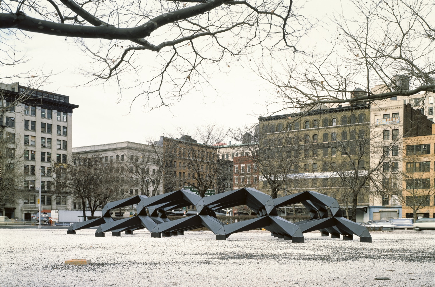 Plywood, painted black
11 &amp;times; 78 &amp;times; 64 ft. (3.35 &amp;times; 23.77 &amp;times; 19.51 m)
Tony Smith: Smug, St. John&amp;#39;s Rotary, Port Authority of New York and New Jersey, 1988