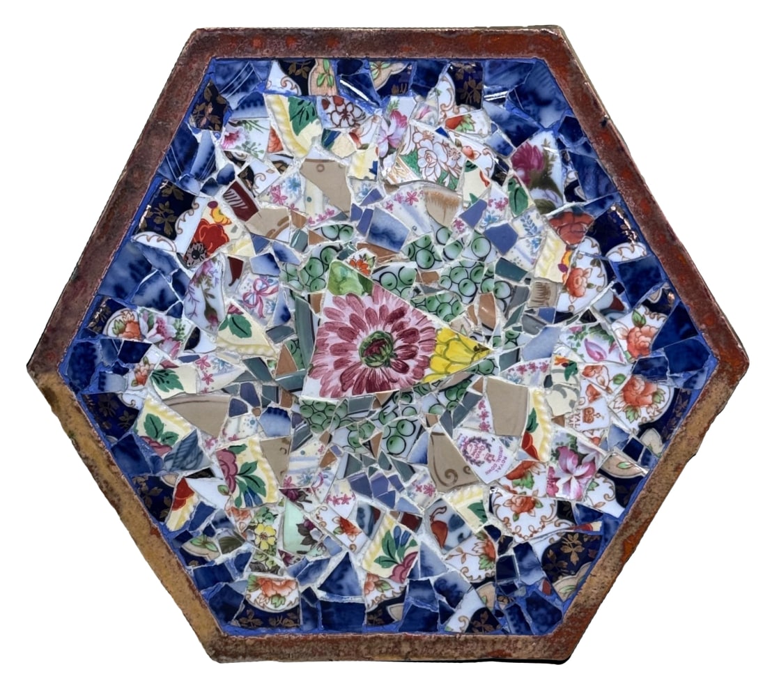 hexagon of pieces of broken ceramics of flowers